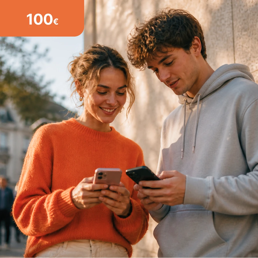 2 Freunde schauen aufs Handy und haben die Chance auf 100 € Empfehlungsbonus bei der TF Bank